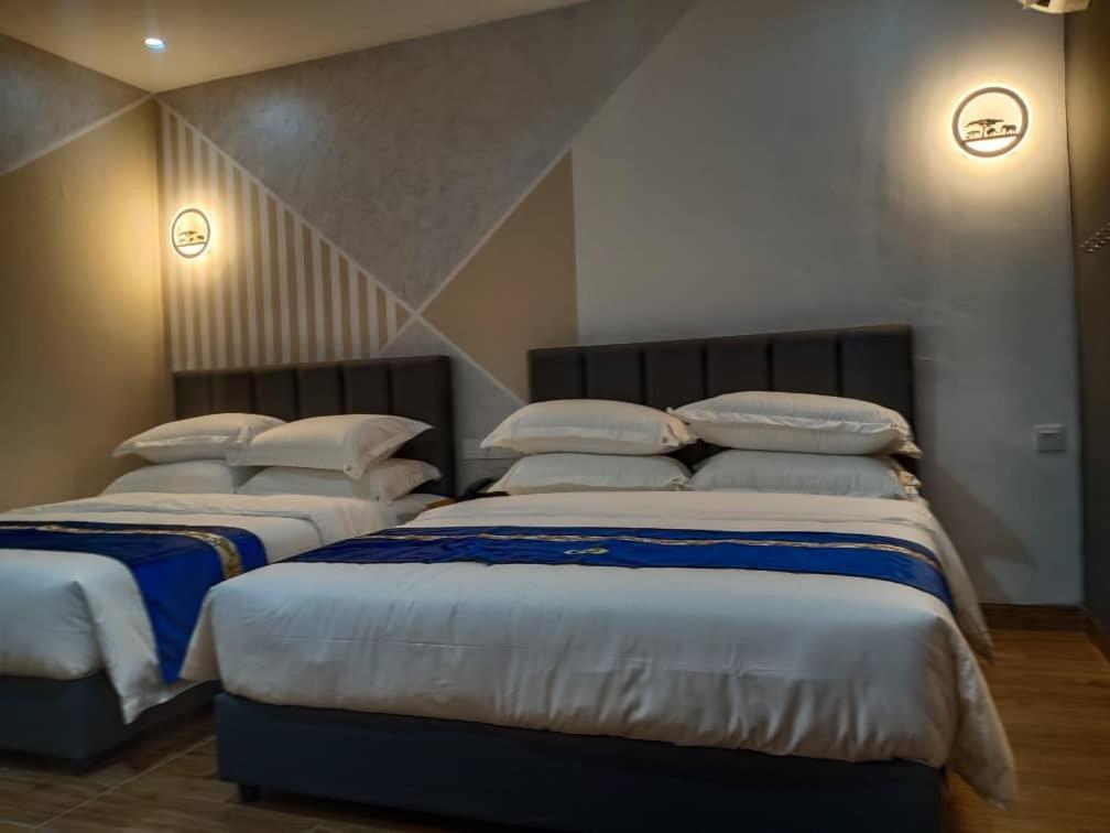 Good 9 Hotel - Cahaya Kota Puteri Пасір-Ґуданґ Екстер'єр фото