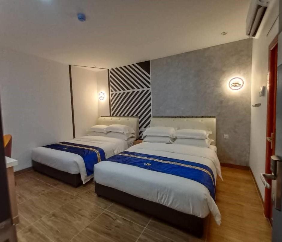 Good 9 Hotel - Cahaya Kota Puteri Пасір-Ґуданґ Екстер'єр фото